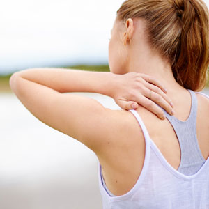 Neuro woman with hand on back