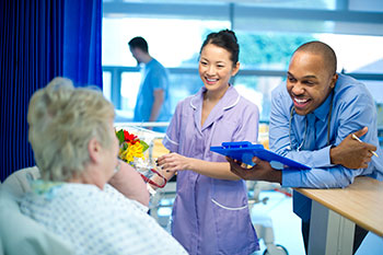 Patient with doctor and nurse